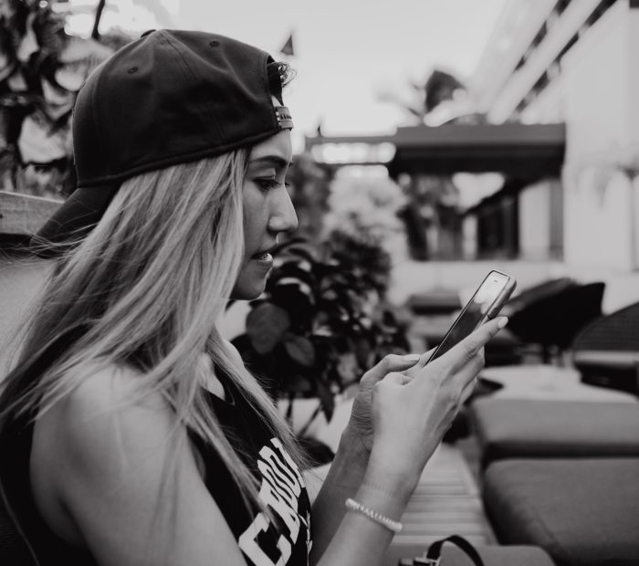 black-and-white-of-young-woman-wearing-baseball-ca-2024-12-06-19-35-27-utc